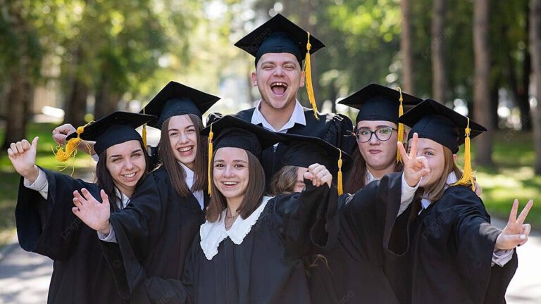 pngtree-a-joyful-bunch-of-graduates-in-cap-and-gowns-outdoorsstrolling-through-the-park-photo-image_51789786